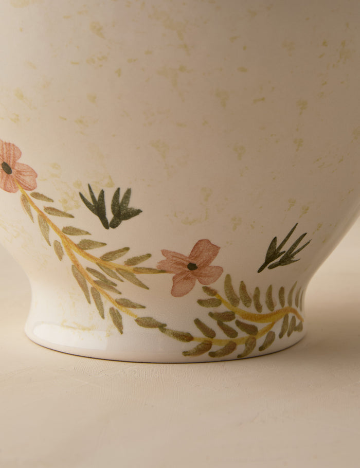 #color::ivory | Close up of the base of the Bea floral motif ceramic vase by Heidi Caillier.