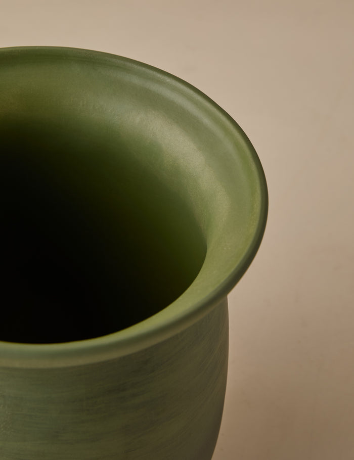 #color::olive | Close up of the Campden matte green ceramic vase by Heidi Caillier.