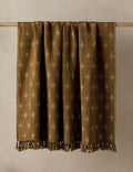 #color::marigold-and-ivory | The Fania lightweight linen-cotton blend floral motif throw.