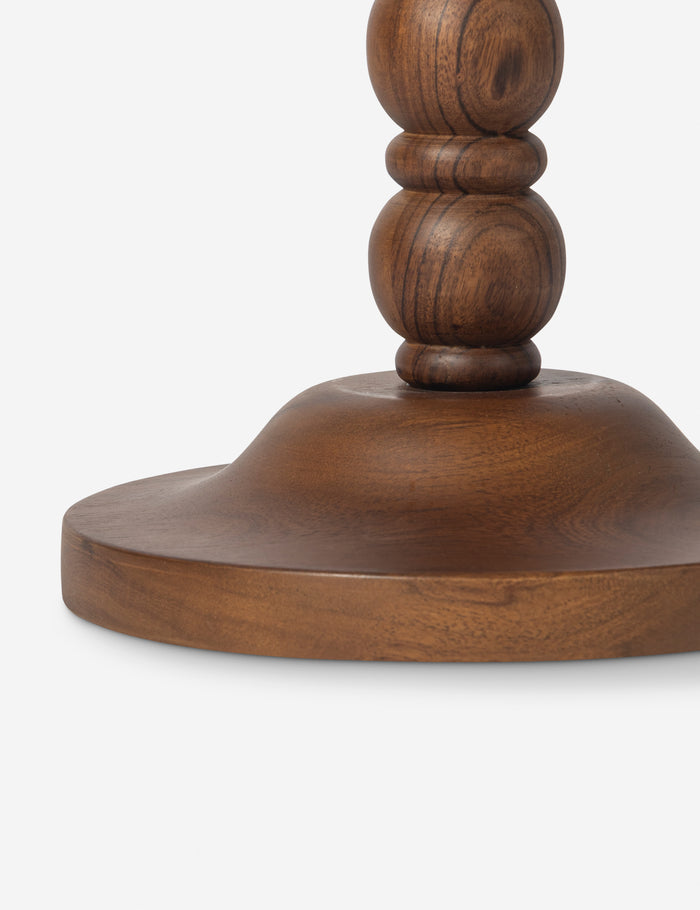 #color::brown | Close up of the base of the Foxton beaded turned wood round drink side table