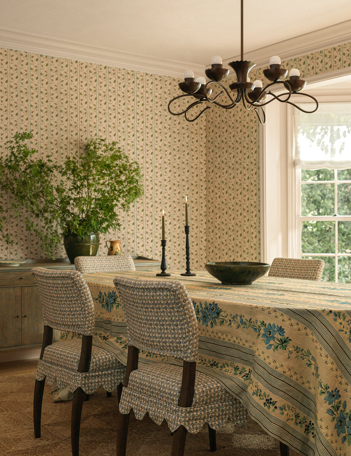 #color::azure #size::large #size::small | Dining table styled with the Golden floral stripe linen tablecloth by Heidi Caillier