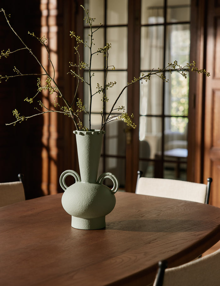 #color::sage | Idra tall round handle ceramic vase by Aimee Song styled on a dining room table