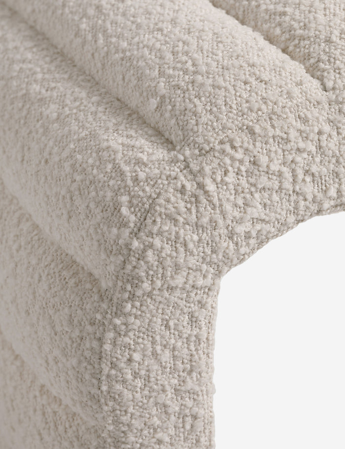 #color::ivory-boucle | Close up of the Leon textural boucle channel tufted waterfall ottoman by Carly Cushnie.