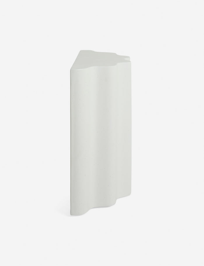 #color::ivory #size::tall | Side view of the Lune half-moon, scalloped concrete side table