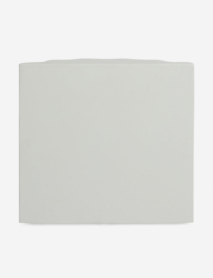 #color::ivory #size::tall | Rear view of the Lune half-moon, scalloped concrete side table