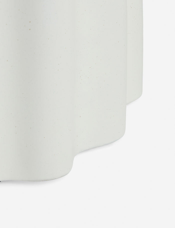 #color::ivory #size::tall | Close up of the Lune half-moon, scalloped concrete side table