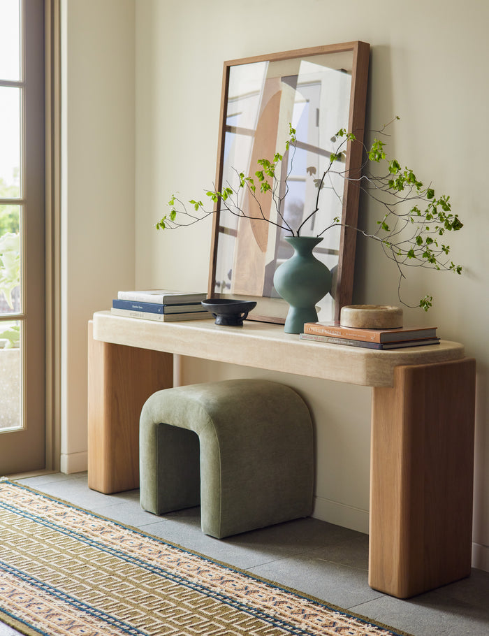 #color::ochre #size::2-6--x-8--runner | The Manca traditional geometric motif hand-knotted wool runner rug styled in front of a console table.