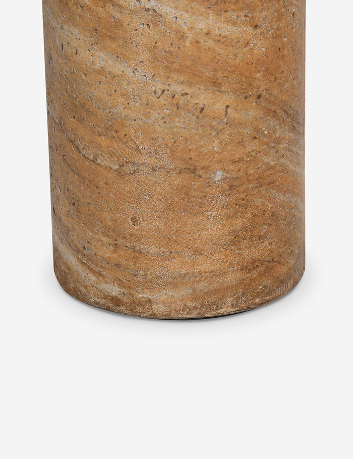 #color::Canyon-Faux-Travertine | Close up of the Mona round stone drink table.