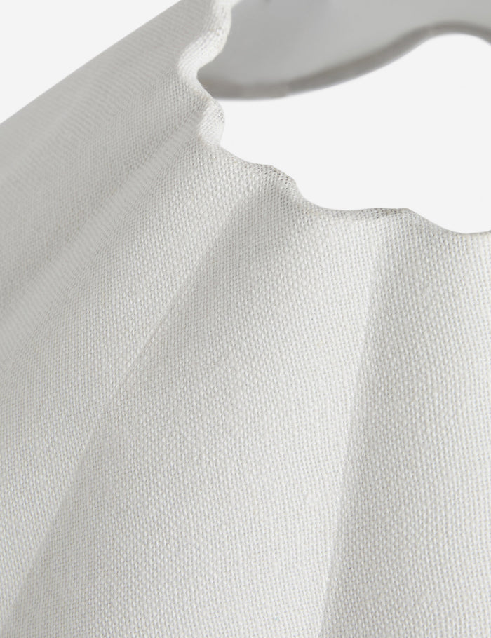 #color::black | Close up view of the Napa scalloped shade table lamp by Aimee Song