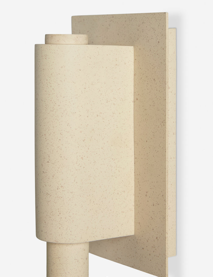 | Close up of the Noor sculptural, wavy swing arm wall sconce