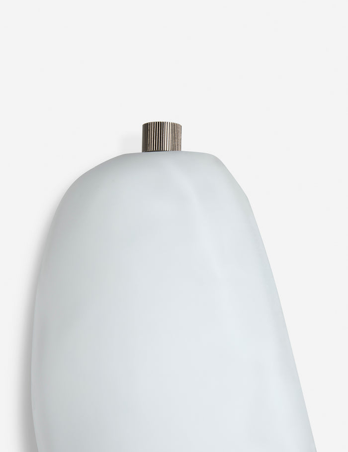 #color::white | Close up of the Plush Puff sculptural wall sconce light