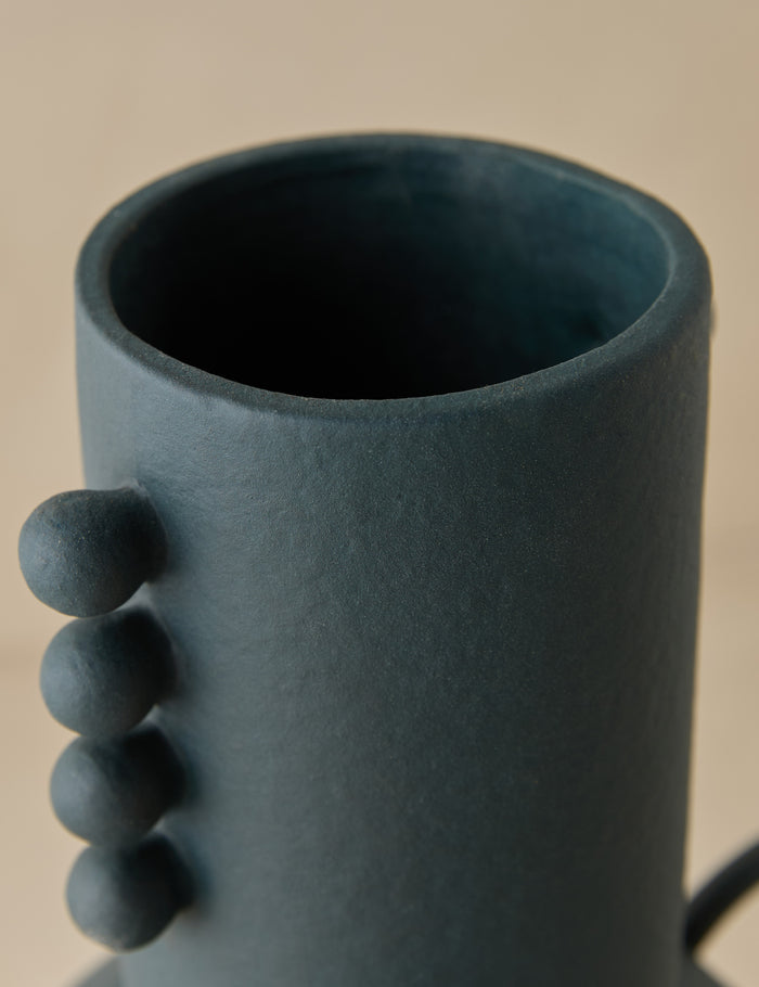 #color::navy | Close up view of the Tosca beaded detailed loop handle ceramic vase by Aimee Song