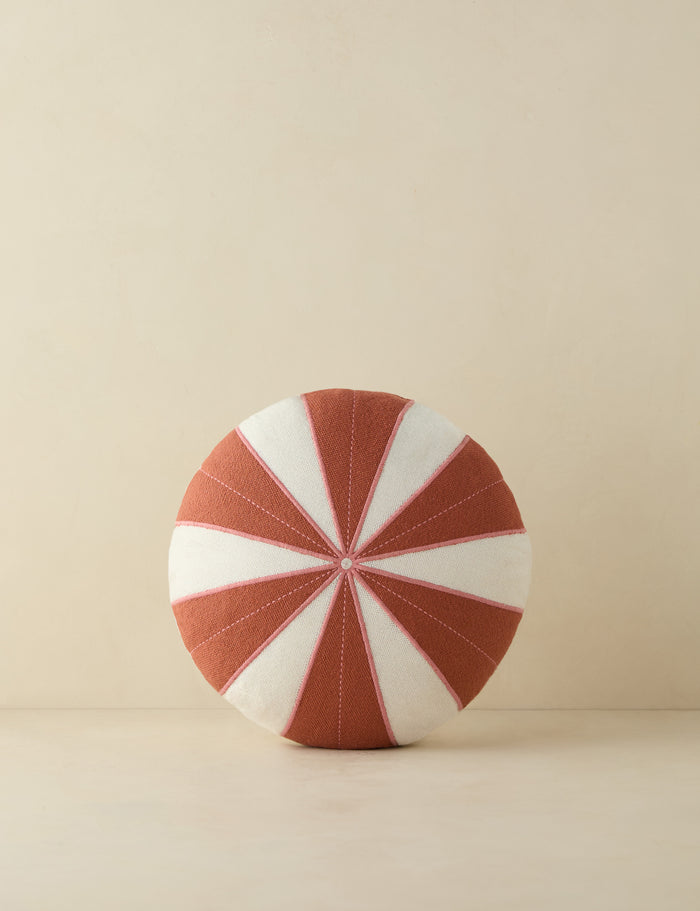 #color::rust | Wrenley high-contrast design disc outdoor pillow